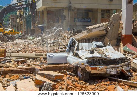 Portoviejo, Ecuador - April, 18, 2016: Collapsed car, showing the aftereffect of 7.8 earthquake that destroyed the city center.