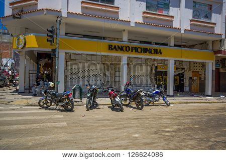 Portoviejo, Ecuador - April, 18, 2016: Pichincha Bank with ATM showing the aftereffect of 7.8 earthquake that destroyed the city center.