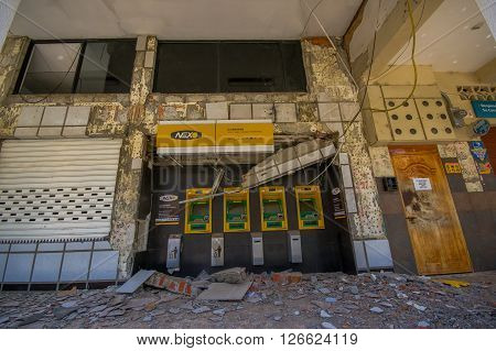 Portoviejo, Ecuador - April, 18, 2016: Pichincha Bank with ATM showing the aftereffect of 7.8 earthquake that destroyed the city center.