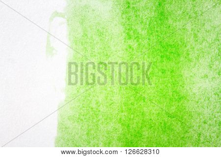Abstract hand drawn green watercolor paints background