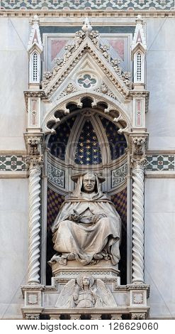 FLORENCE, ITALY - JUNE 05: Cardinal Pietro Valeriani, Left Portal of Cattedrale di Santa Maria del Fiore (Cathedral of Saint Mary of the Flower), Florence, Italy on June 05, 2015