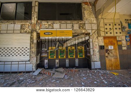 Portoviejo, Ecuador - April, 18, 2016: Pichincha Bank with ATM showing the aftereffect of 7.8 earthquake that destroyed the city center.