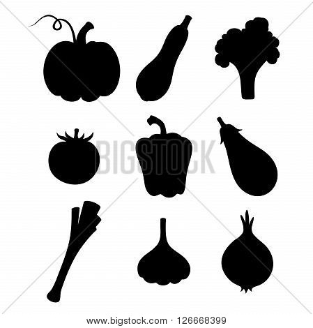 Vector set of black silhouettes of various vegetables isolated on a white background.