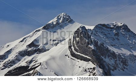 Snow capped peak of Mt Oldenhorn. Mountain near Gstaad, Swiss Alps.