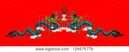The chinese dragon isolated on red background