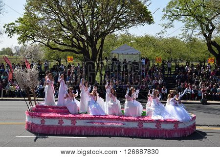 WASHINGTON, DC - APR 16: Cherry Blossom Queen float at the 2016 National Cherry Blossom Parade in Washington DC, as seen on April 16, 2016. Thousands of visitors gathered to attend this annual event.