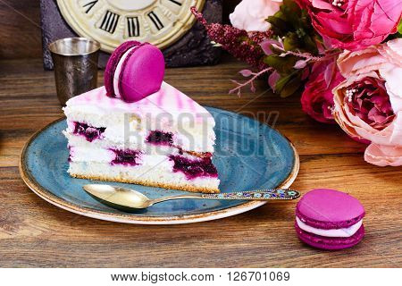 Sweet and Colourful Cake with French Macaroons. Studio Photo