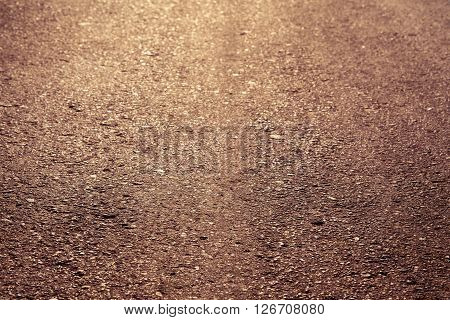 mpty asphalt roadway with sunlight for design