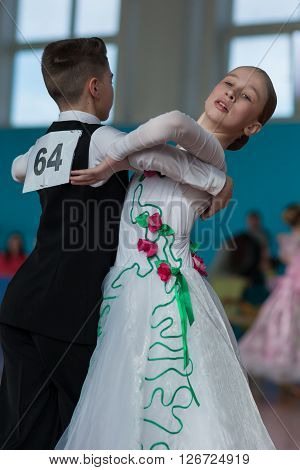 Minsk Belarus -April 3 2016: Panasyuk Maksim and Belyankina Liana Perform Juvenile-1 Standard Program on the IDSA Championship Kinezis Star Cup - 2016 in April 3 2016 in Minsk Republic of Belarus