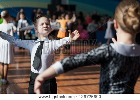 Minsk Belarus -April 3 2016: Unidentified Dance Couple Performs Juvenile-1 Standard European Program on the IDSA Championship Kinezis Star Cup - 2016 in April 3 2016 in Minsk Republic of Belarus