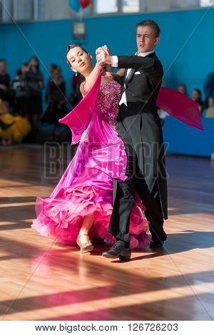 Minsk Belarus -April 3 2016: Unidentified Dance Couple Performs Youth-2 Standard Program on the IDSA Championship Kinezis Star Cup - 2016 in April 3 2016 in Minsk Republic of Belarus