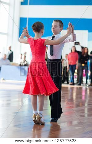 Minsk Belarus -April 3 2016: Unidentified Dance Couple Performs Juvenile-1 Standard European Program on the IDSA Championship Kinezis Star Cup - 2016 in April 3 2016 in Minsk Republic of Belarus