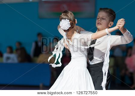 Minsk Belarus -April 3 2016: Hamko Egor and Bloshentceva Diana Perform Juvenile-1 Standard European Program on the IDSA Championship Kinezis Star Cup - 2016 in April 3 2016 in Minsk Republic of Belarus