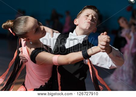 Minsk Belarus -April 3 2016: Rakovich Nikita and Trohina Anastasiya Perform Juvenile-1 Standard European Program on the IDSA Championship Kinezis Star Cup - 2016 in April 3 2016 in Minsk Republic of Belarus
