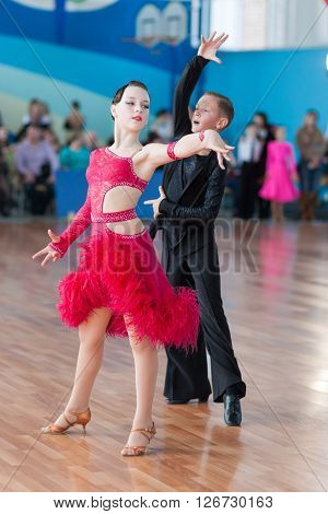 Minsk Belarus -April 3 2016: Unidentified Dance Couple Performs Juvenile-1 Latin-American Program on the IDSA Championship Kinezis Star Cup - 2016 in April 3 2016 in Minsk Republic of Belarus