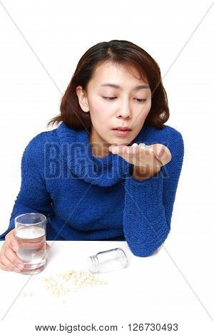 Asian woman suffers from melancholy on white background