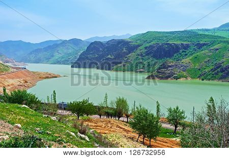 The green waters of the Achangaran reservoir with the Qurama Mountains on the background Uzbekistan.
** Note: Soft Focus at 100%, best at smaller sizes