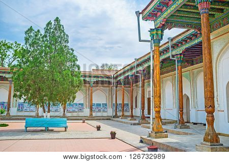 KOKAND UZBEKISTAN - MAY 6 2015: The main courtyard of Khudayar Khan Palace welcomes tourists and represents the architectural ensemble of the mansion on May 6 in Kokand.