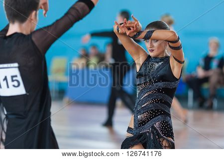 Minsk Belarus -April 3 2016: Silich Sergey and Borovskaya Olga Perform Youth Latin-American Program on IDSA Championship Kinezis Star Cup - 2016 in April 3 2016 in Minsk Republic of Belarus