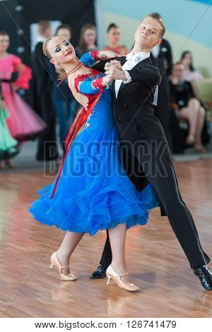 Minsk Belarus -April 3 2016: Prohorenko Dmitry and Rymchenok Valeriya Perform Youth-2 Standard Program on the IDSA Championship Kinezis Star Cup in April 3 2016 in Minsk Republic of Belarus