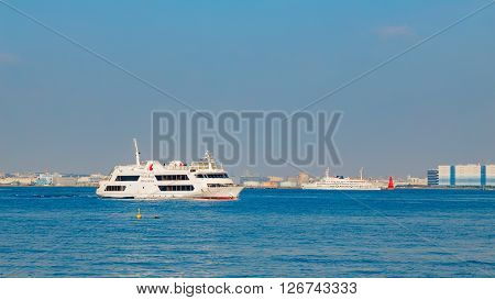 YOKOHAMA JAPAN - NOVEMBER 24 2015: Yokohama Port has 10 major piers. In 2013 the Port served 37706 ships. It handled 271276977 tons of cargo and 2888220 TEU containers