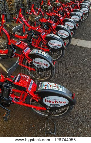 YOKOHAMA JAPAN - NOVEMBER 24 2015: Bay Bike is a bicycle sharing system that has docking ports in designated areas managed by Docomo Japan's biggest private telecommunicatiom company
