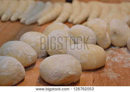 floury dough and shaping hand pastries, food industry