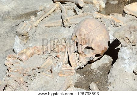 skull of long time ago dead man in the ruins of Ercolano Italy