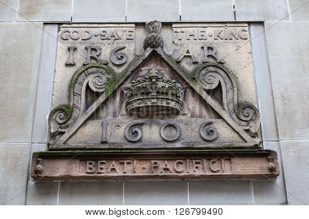 One of the old signs from Netherbow Port which once stood on the Royal Mile in Edinburgh. The sign is now displayed on the exterior of the Scottish Storytelling Centre on the Royal Mile.