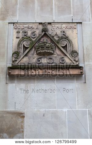 One of the old signs from Netherbow Port which once stood on the Royal Mile in Edinburgh. The sign is now displayed on the exterior of the Scottish Storytelling Centre on the Royal Mile.