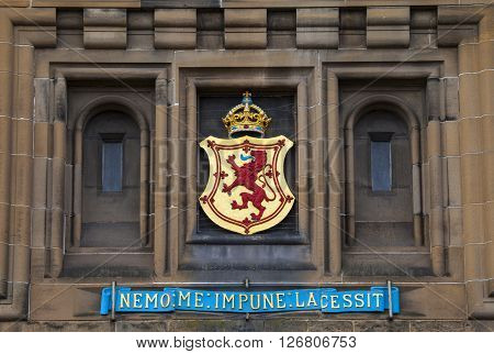The Lion Rampant crest above the main entrance of Edinburgh Castle in Scotland.