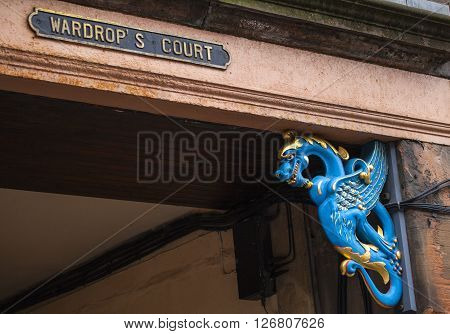 A street sign for the historic Wardrops Court along the Royal Mile in Edinburgh Scotland.