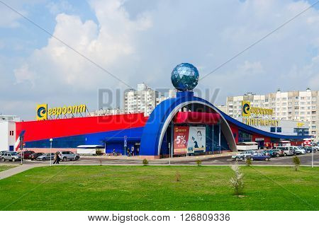 GOMEL BELARUS - APRIL 14 2016: Unidentified people go to the hypermarket Euroopt on the Street Khatayevich Gomel Belarus