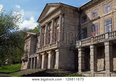 The building of the old ducal palace of 19 century with columns at the entrance.