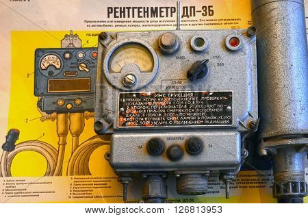 ILLUSTRATIVE EDITORIAL.Vintage Soviet military radiometer DP-3B.For tanks and another transport.Background - poster Soviet Civil Defense: DP-3B,design and usage.At April 19,2016 Kiev, Ukraine