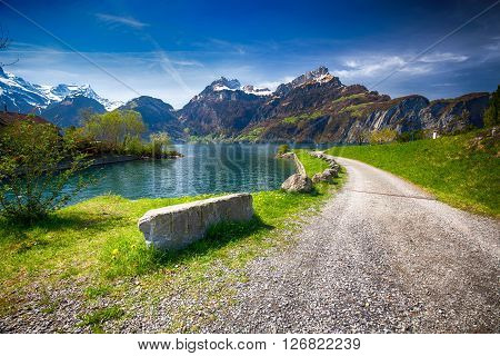 Beautiful Sea Promenade In Sisikon Village With The View Of Swiss Alps And Lucerne Lake, Switzerland