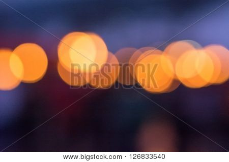 Abstract orange circular bookeh as a background