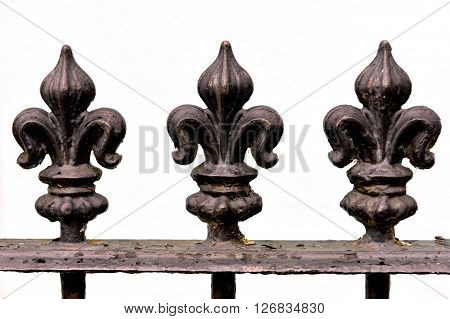 Triple iron fleur de lis railing finials