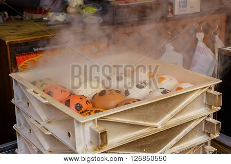 YOKOHAMA JAPAN - NOVEMBER 24 2015: Chinese steamed bun in Yokohama Chinatown, Japan's largest chinatown. A large number of Chinese stores and restaurants can be found in the narrow and colorful streets