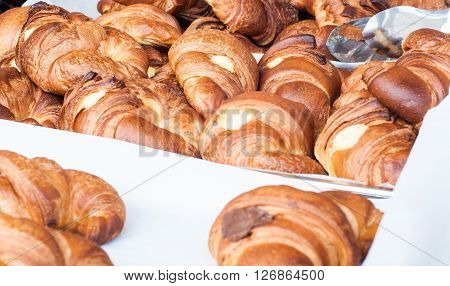 group of croissants with jam vanilla cream and honeyitaly
