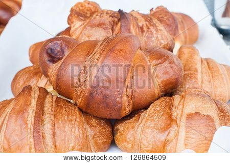 group of croissants with jam vanilla cream and honeyitaly