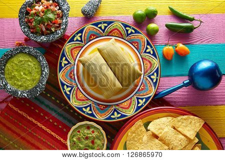 Mexican Tamale tamales of corn leaves with chili and sauces