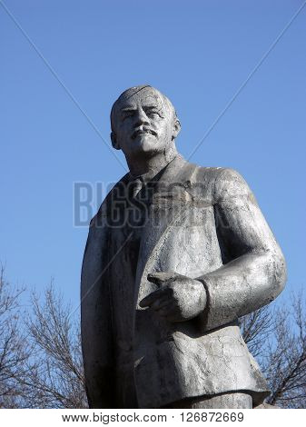 Historical metal monument of Lenin in perspective in small Russian village Shornovo