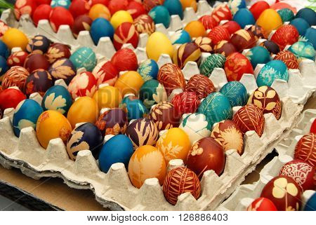 many various colorful easter eggs in eggboxes Serbia