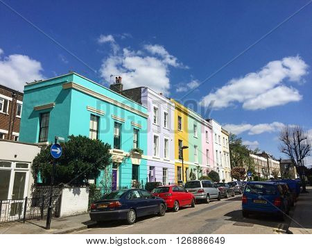 LONDON - APRIL 19: Vibrant terraced houses on April 19, 2016 in Kentish Town, London, UK.