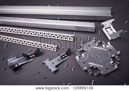 Profile for plasterboard, plasterboard fastening, set of building profiles, building materials, steel profiles for repair, construction works, modern building materials, screws for construction