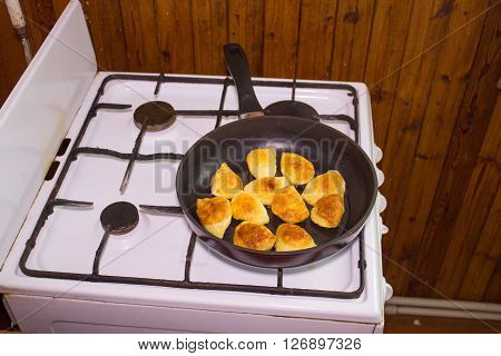 Pirogie baked in frying pan at home