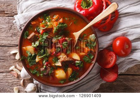 Traditional Hungarian Goulash Soup Bogracs Close-up In A Bowl. Horizontal Top View