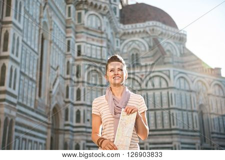 Happy Woman Tourist With Map Standing In Front Of Duomo, Italy