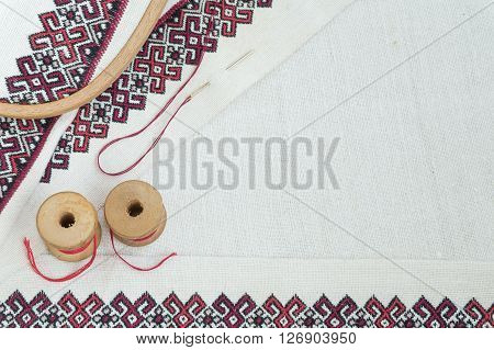 Fragment of embroidery on linen and accessories